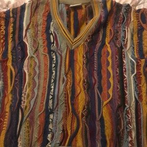 Coogi sweater good condition loose stitches
